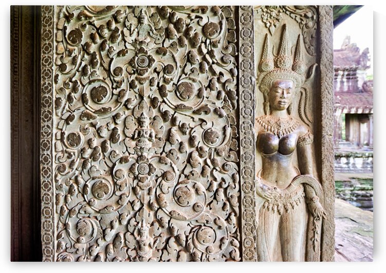 Intricate stone carvings of a deity and patterns at an ancient t by Marco Brivio