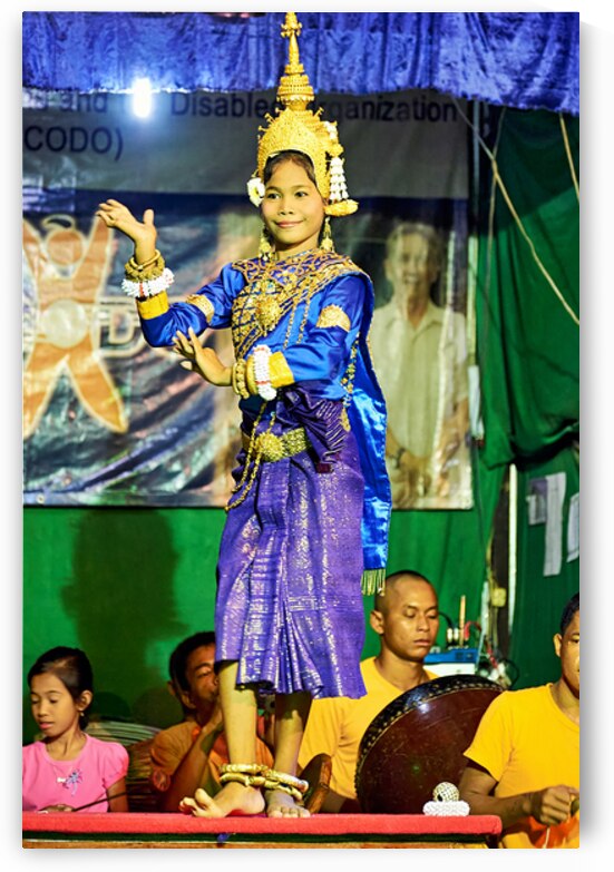 Young girl performs traditional Cambodian dance in ornate costum by Marco Brivio