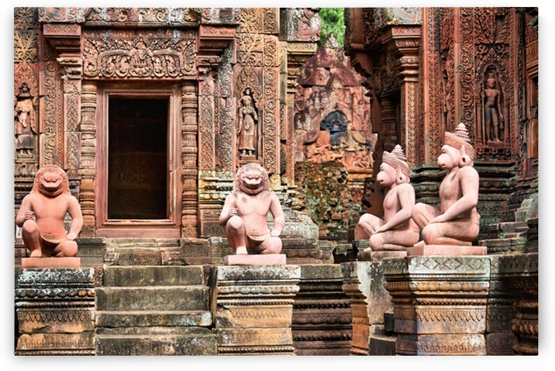 Ancient Cambodian temple with intricate red sandstone carvings a by Marco Brivio