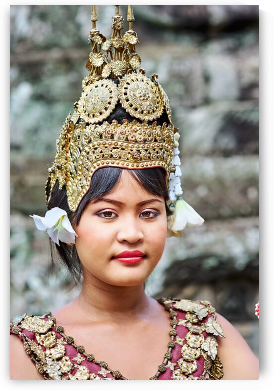 Traditional Cambodian dancer in ornate golden headdress. by Marco Brivio