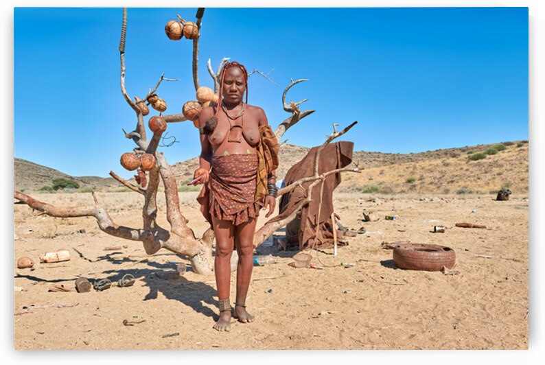 Portrait of a Himba woman standing in Kunene Namibia by Marco Brivio