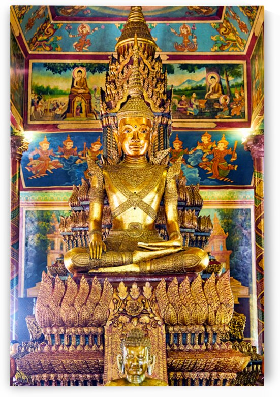 Ornate golden Buddha statue surrounded by colorful temple murals by Marco Brivio