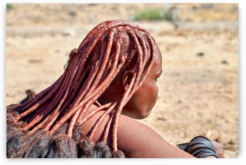 Portrait of Himba woman with traditional headdress in Namibia by Marco Brivio