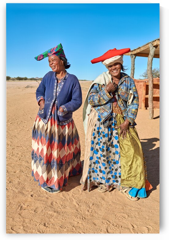 Women from Herero Bantu ethnic group in Namibia stand together by Marco Brivio