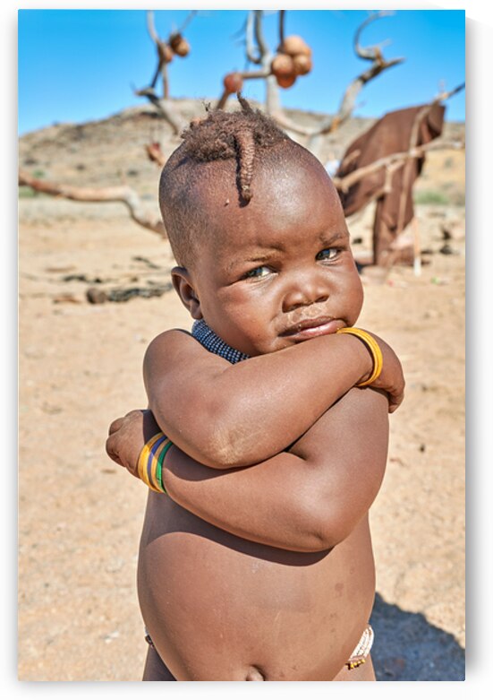 Portrait of a Himba child in the Kunene region of Namibia by Marco Brivio