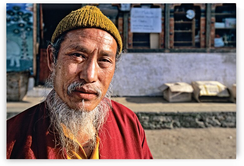 Portrait of a man with a long white beard and yellow beanie. by Marco Brivio