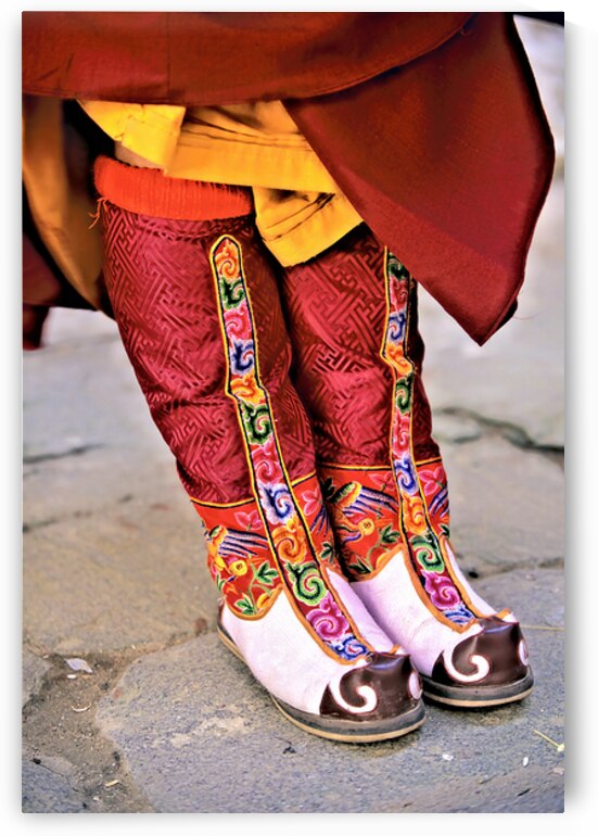 Colorful embroidered traditional boots and robes. by Marco Brivio