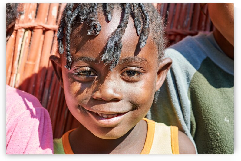 Joyful child in Kavango Region of Namibia by Marco Brivio