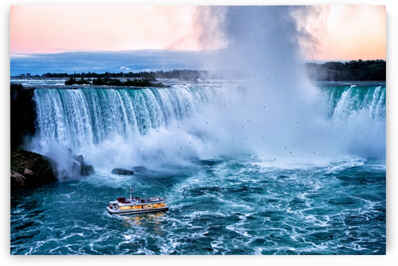 Hornblower boat approaches powerful Niagara Falls. by Marco Brivio