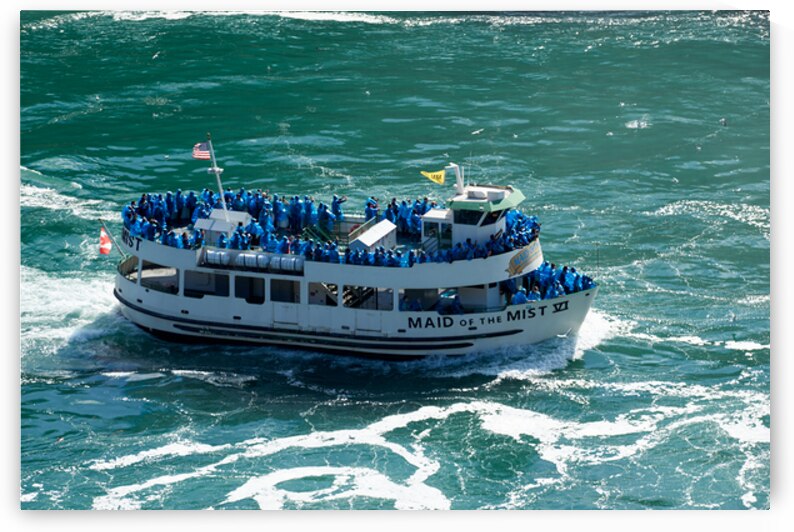 Maid of the Mist boat carrying tourists through water. by Marco Brivio