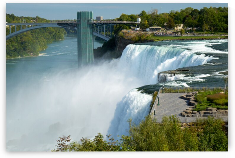 Niagara Falls bridge and observation deck on a sunny day. by Marco Brivio