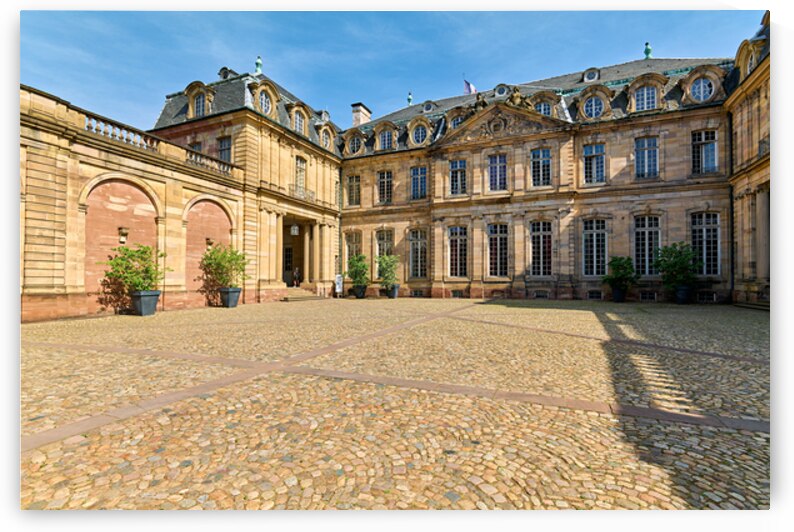 Visitors walk through courtyard at Palais Rohan in Strasbourg Al by Marco Brivio