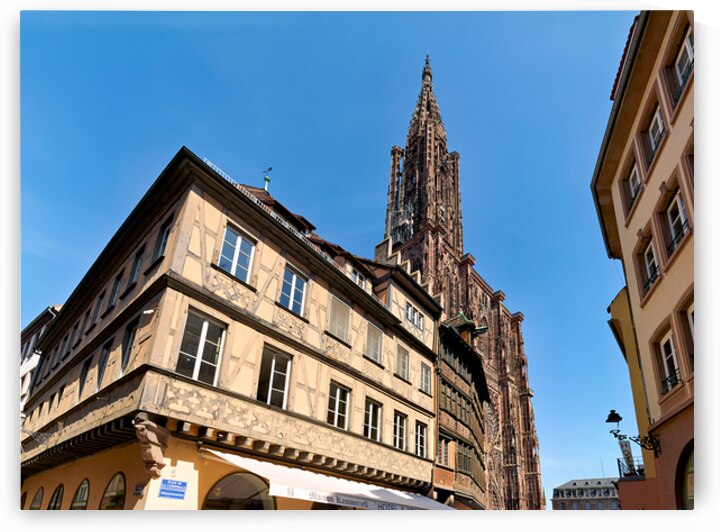 People walk by Kammerzell House near Strasbourg Cathedral in Als by Marco Brivio