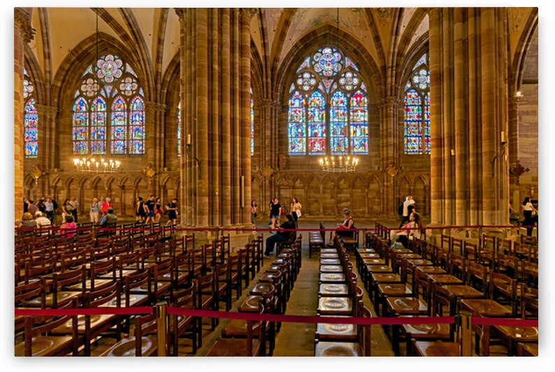 Visitors explore stained glass in Strasbourg Cathedral by Marco Brivio