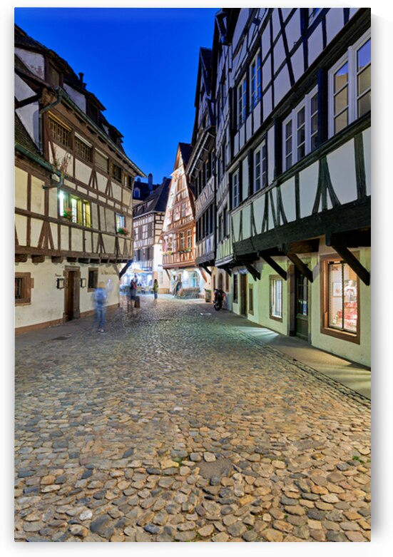 Historic timber framed houses in Petit France district at dusk by Marco Brivio