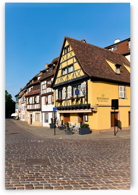 Visitors walk in Petite Venise while exploring timber framed hou by Marco Brivio