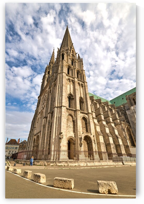 Chartres Cathedral stands tall in Chartres France under a blue s by Marco Brivio