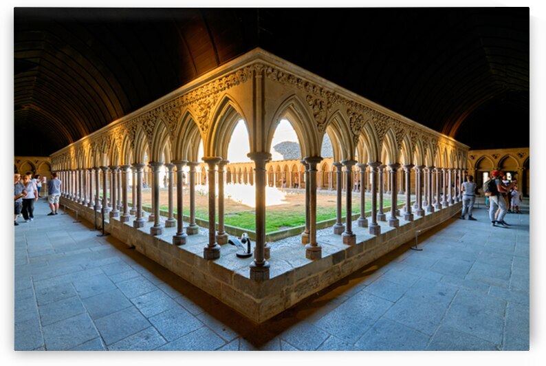 Exploring the cloister at Mont Saint Michel abbey in Normandy Fr by Marco Brivio
