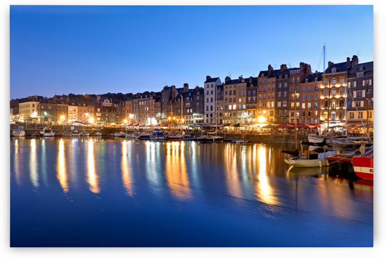 Harbour view of Honfleur at dusk with boats and buildings by Marco Brivio