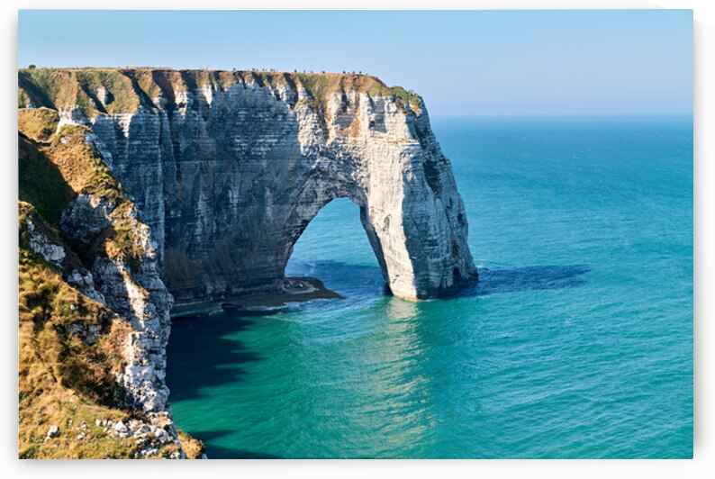 Chalk cliffs of Etretat along the coast of Normandy in France by Marco Brivio