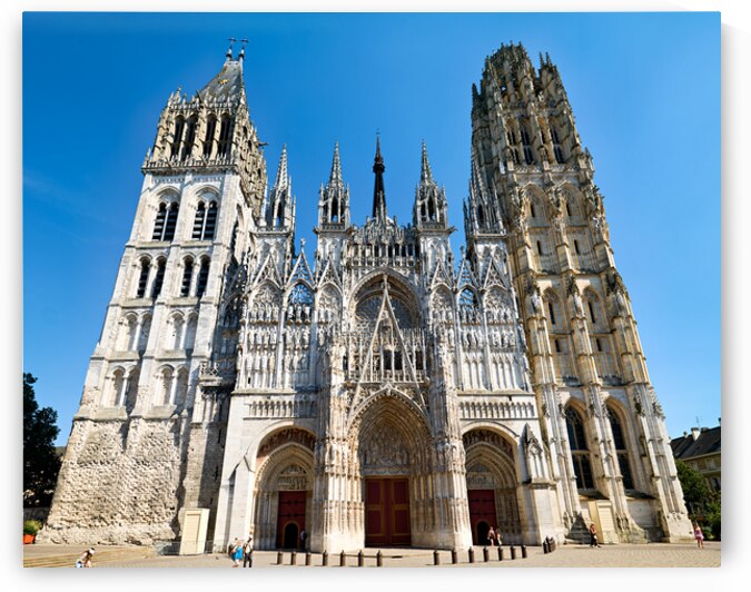 Notre Dame Cathedral stands tall in Rouen Normandy under clear s by Marco Brivio