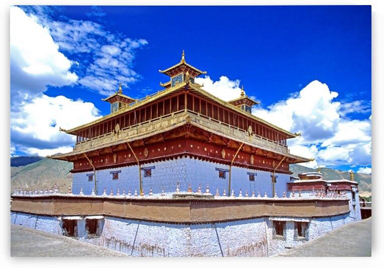 Golden roof of ancient Tibetan monastery under blue sky by Marco Brivio