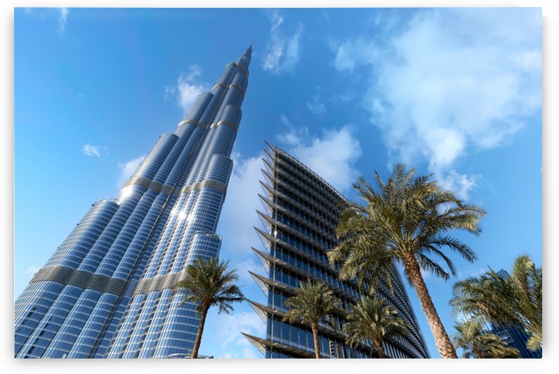 Burj Khalifa among modern buildings and palm trees in Dubai by Marco Brivio