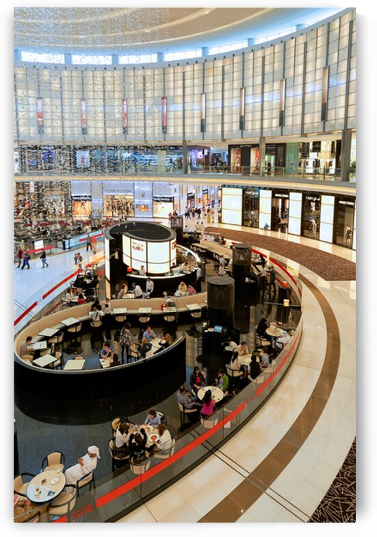 Bustling mall with cafe in Dubai attracts shoppers and visitors by Marco Brivio