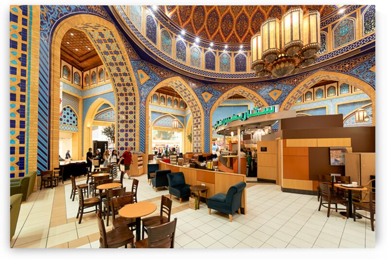Starbucks store in decorated mall with customers in Dubai UAE by Marco Brivio
