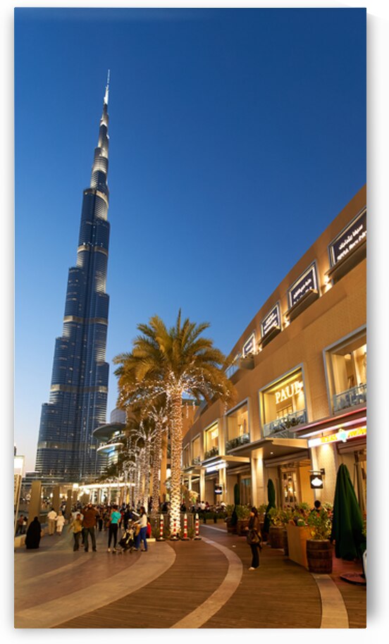 View of Burj Khalifa and Dubai promenade at twilight in Dubai UA by Marco Brivio