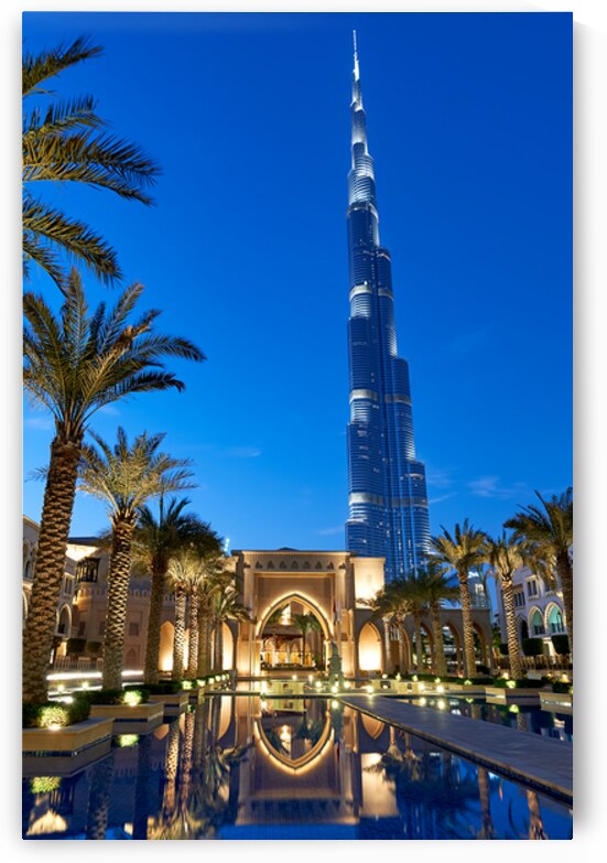 Dubai skyline with Burj Khalifa palm trees and reflections at  by Marco Brivio