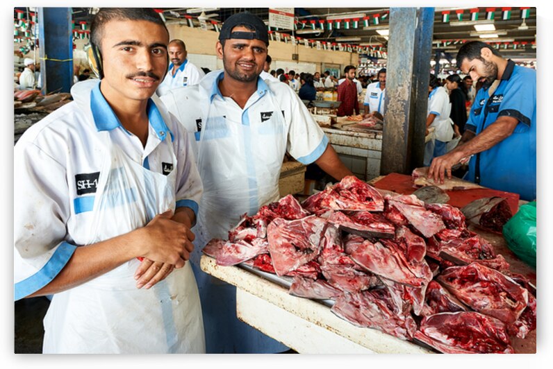 Fish market scene with men at work in Dubai UAE by Marco Brivio