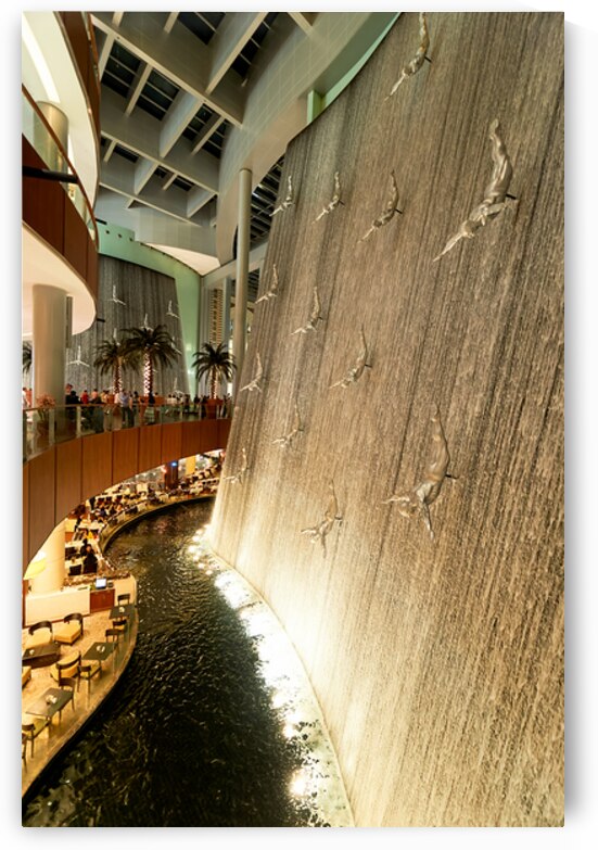 Indoor waterfall with diving sculptures and dining in Dubai UAE by Marco Brivio