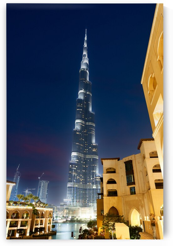 Burj Khalifa shining bright at night in Dubai UAE by Marco Brivio