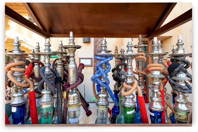 Colorful hookahs with hoses in market in Dubai UAE by Marco Brivio