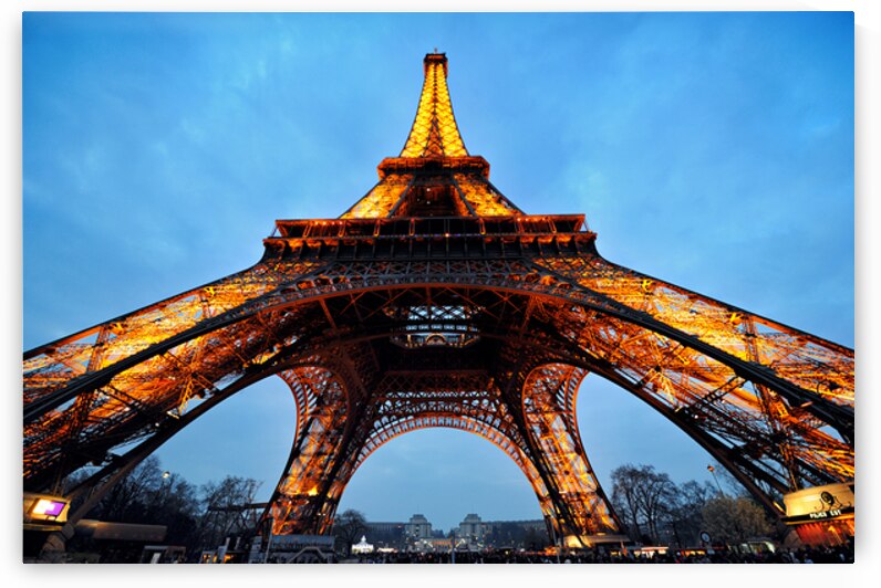 Eiffel Tower shining brightly at night in Paris France by Marco Brivio