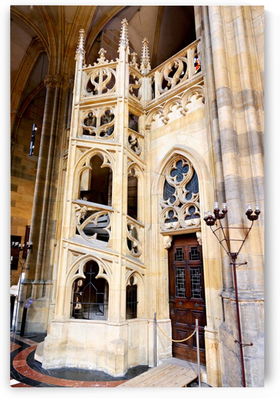 Ornate Gothic stone structure and door inside a cathedral. by Marco Brivio