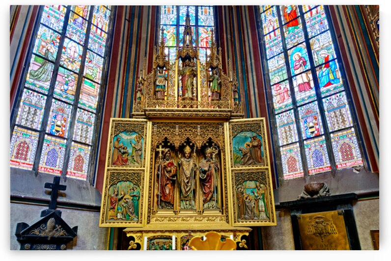 Ornate golden altarpiece and vibrant stained glass windows in a  by Marco Brivio