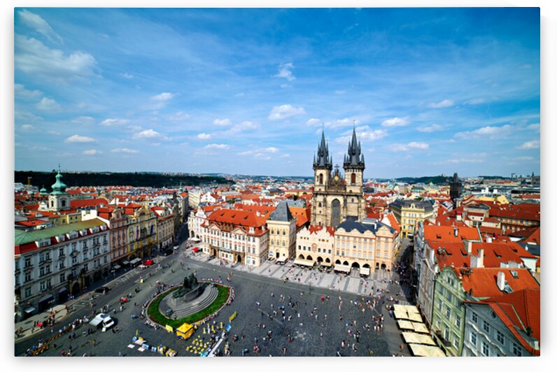 Aerial view of bustling Prague Old Town Square and Týn Church. by Marco Brivio