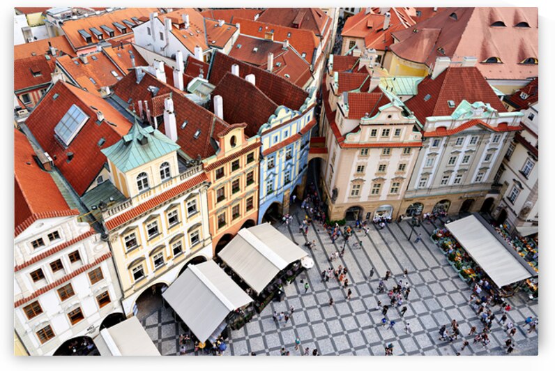 Aerial view of a bustling European city square with red roofs. by Marco Brivio