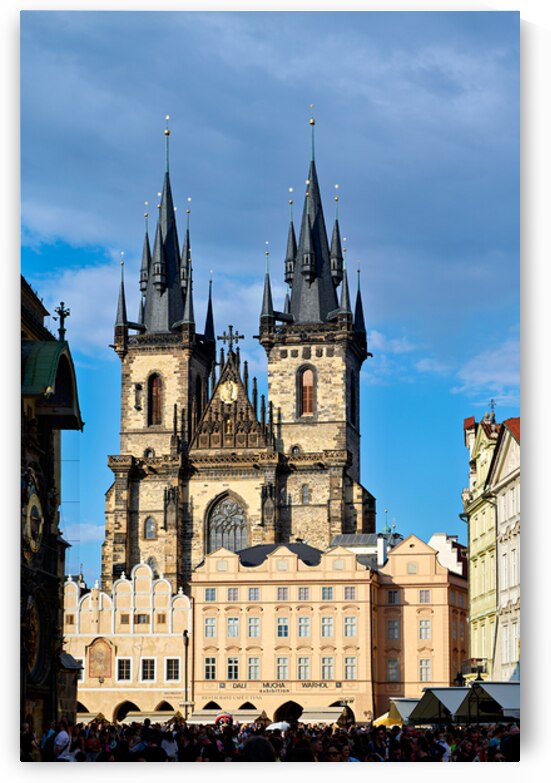 Pragues Týn Church towers over Old Town Square crowd. by Marco Brivio