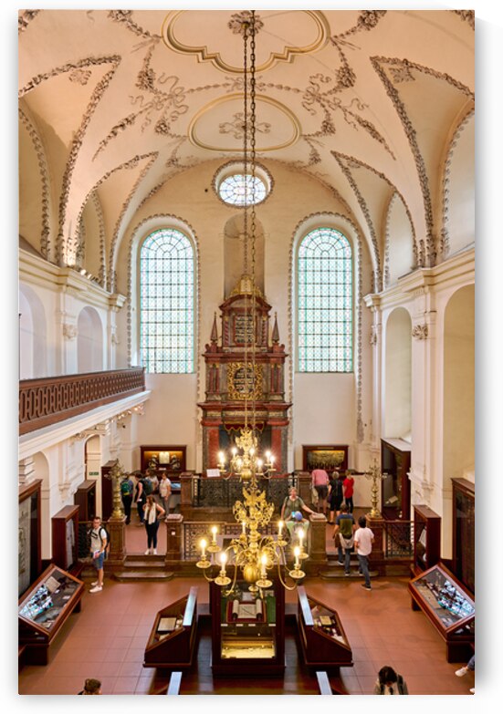 Ornate synagogue interior with tourists chandelier and stained by Marco Brivio