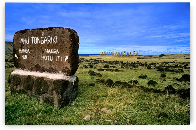 Easter Islands Ahu Tongariki Moai statues and directional sign. by Marco Brivio