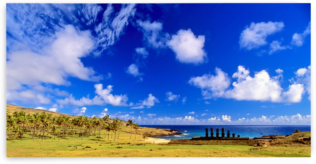 Moai statues palm trees and beach on Easter Island. by Marco Brivio