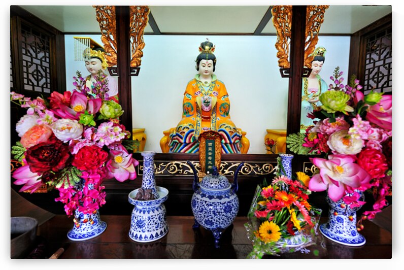 Colorful statues inside a traditional Asian shrine in Shanghai by Marco Brivio