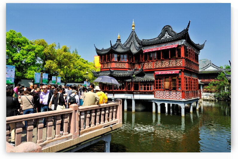 Crowd visits traditional Chinese tea house beside water in Shang by Marco Brivio