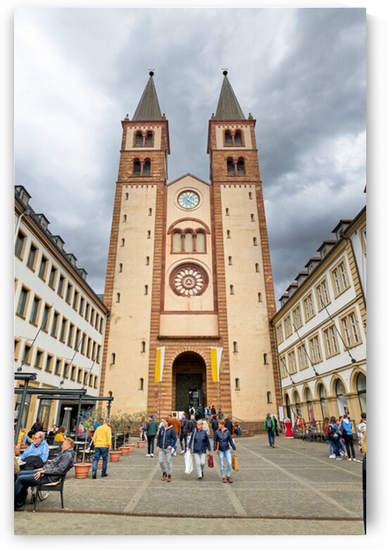 Visitors explore Wurzburger Dom Cathedral in Bavaria Germany by Marco Brivio