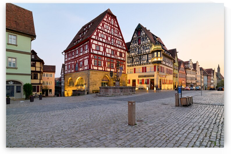 Rothenburg ob der Tauber shows its historic buildings at sunset by Marco Brivio