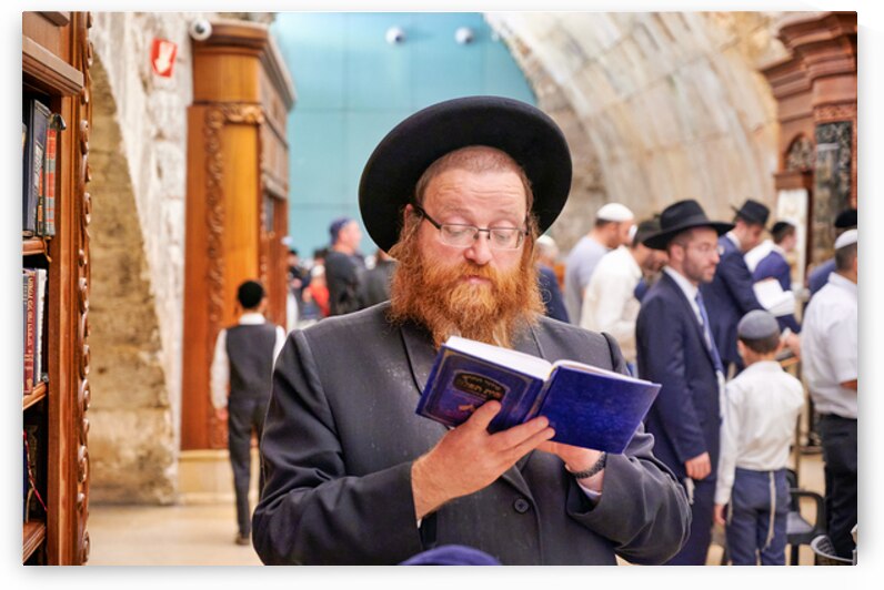 Orthodox Jews pray at the Western Wall in Jerusalem by Marco Brivio