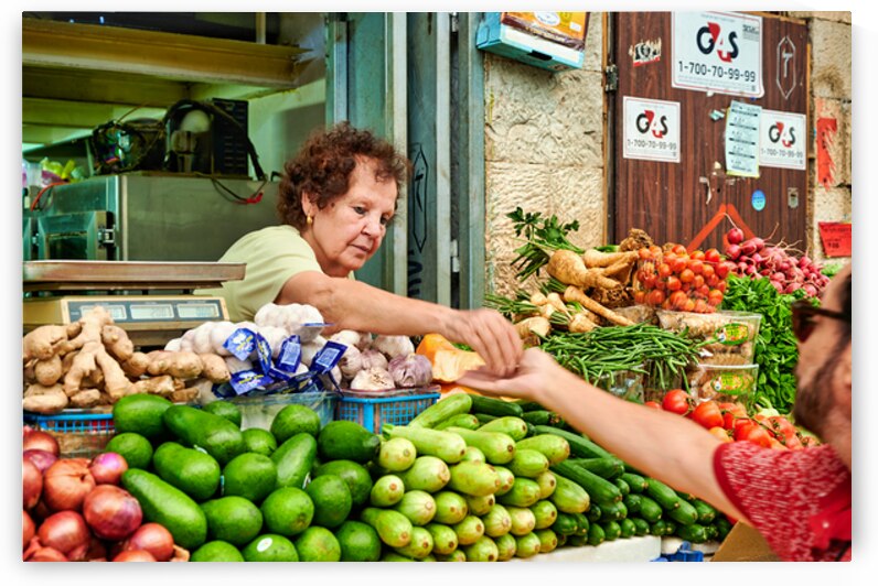 Local vendor sells fresh produce in Mahane Yehuda Market by Marco Brivio